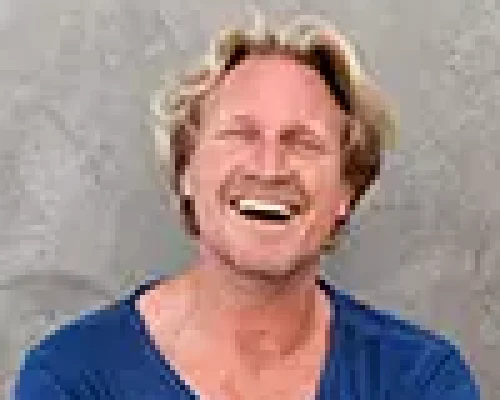 handsome-caucasian-man-smiling-with-arms-crossed-1